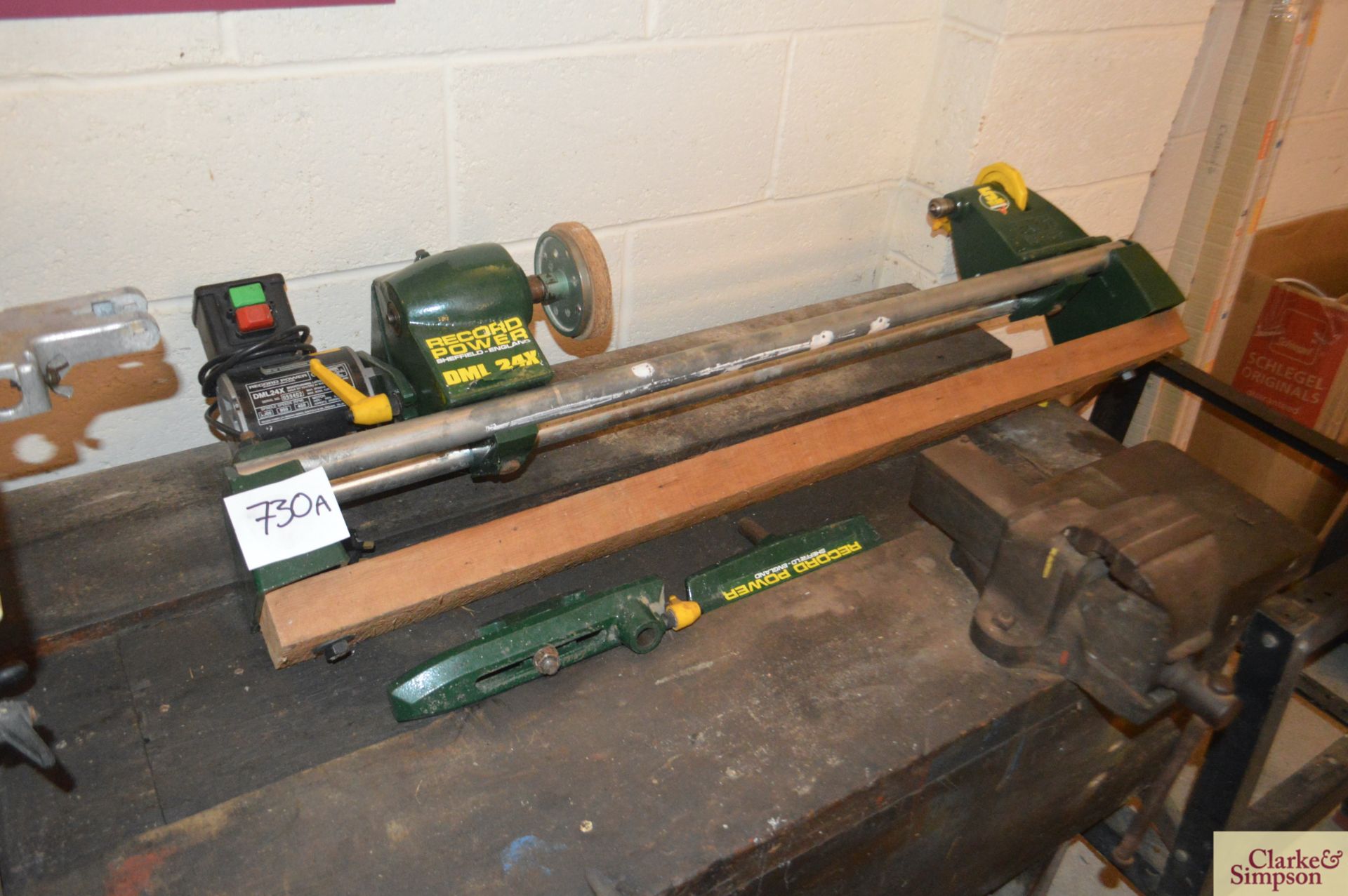 Record power lathe and attachments.