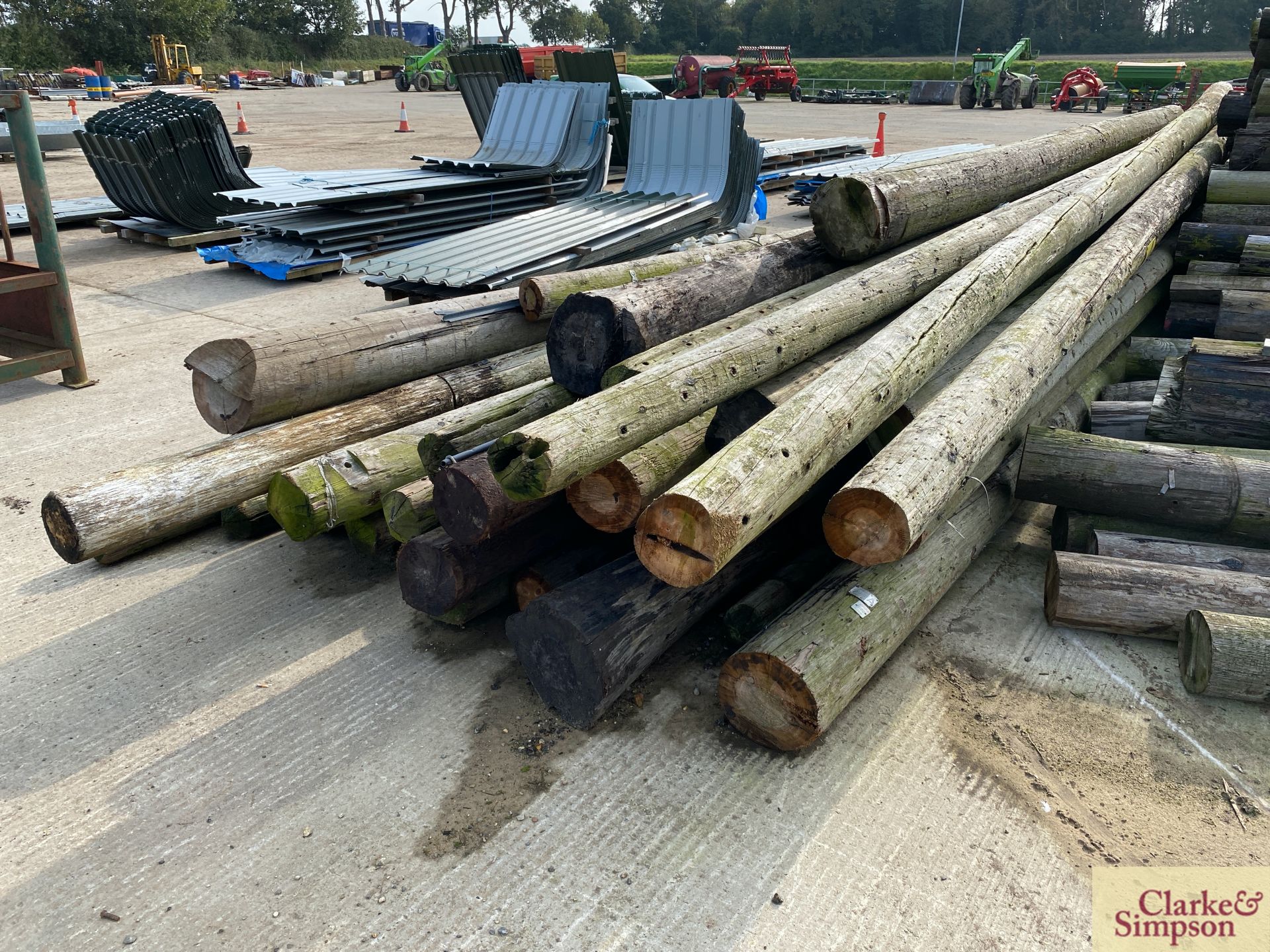 c. 40 telegraph poles of varying sizes. Approximately 28ft in length. * [Located Roudham] - Image 2 of 5
