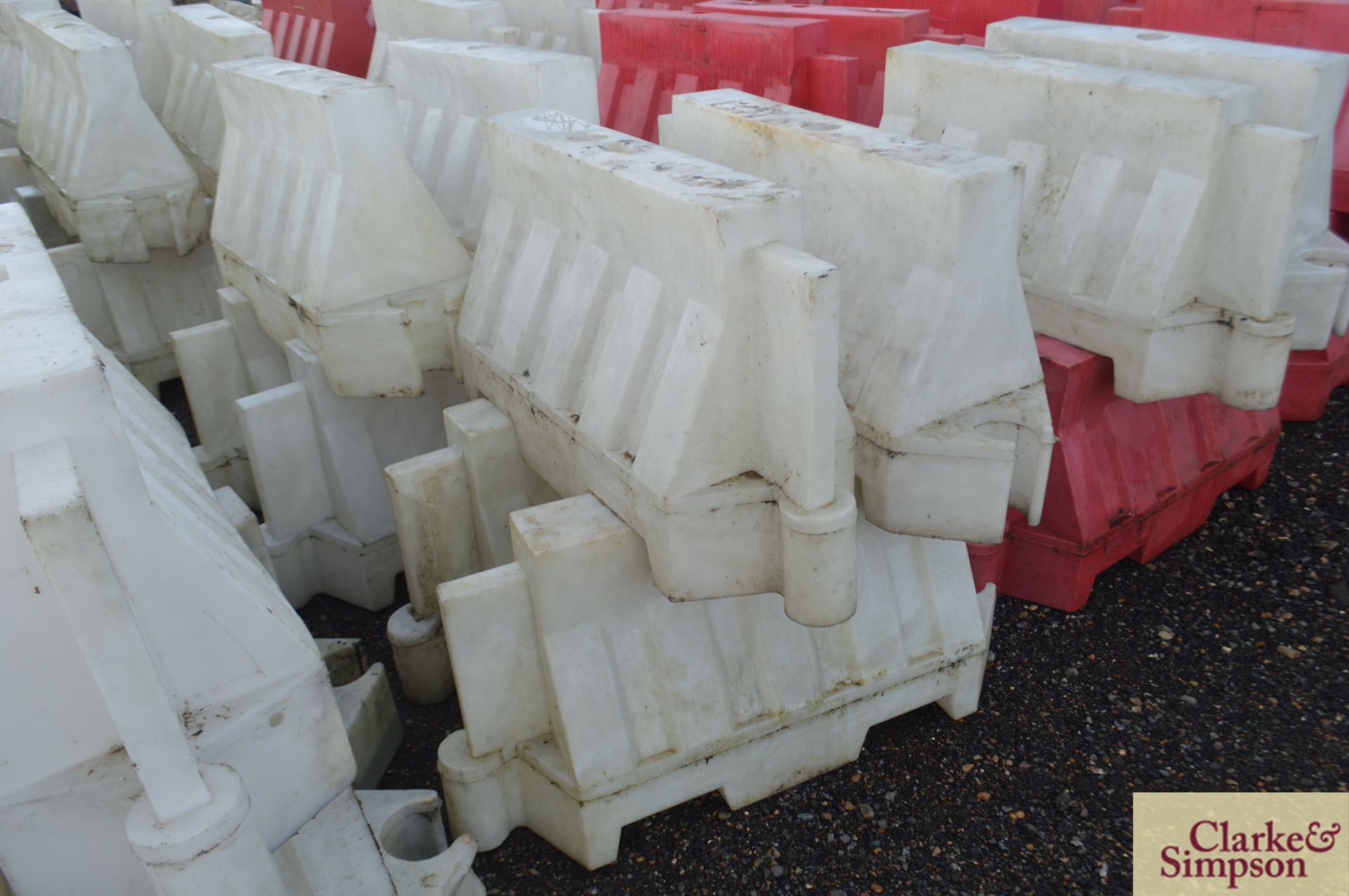 Large quantity of water filled traffic barriers. * - Image 4 of 7