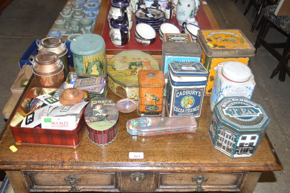 A quantity of various tins containing playing card