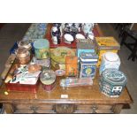 A quantity of various tins containing playing card
