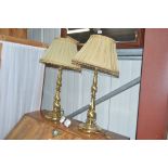 A pair of Laura Ashley brass table lamps with shad