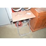 A beech effect and metal folding table