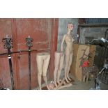 A mannequin and various mannequin parts