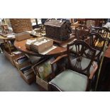 A reproduction mahogany extending table with one e