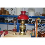 Two brass and glass oil lamps