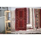 An approx. 7'6" x 3'8" Eastern patterned rug AF