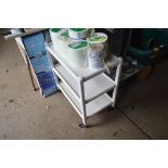 A white painted three tier tea trolley