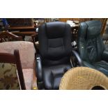 A black upholstered swivel office chair