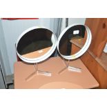 Two circular dressing table mirrors