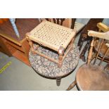 A string top stool and a fabric upholstered circul