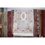 An approx. 5'9" x 3' Eastern patterned rug