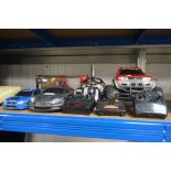 Four various remote controlled cars