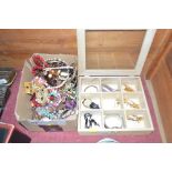 A box of various watches and a box of costume jewe