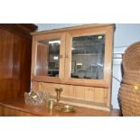 A pine mirror fronted cabinet