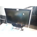 A Finlux flat screen television with remote contro