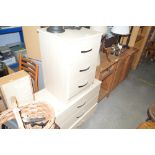 Two beech effect three drawer chests