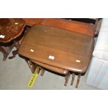 A nest of three Ercol occasional tables