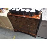 A Georgian style reproduction mahogany chest fitte