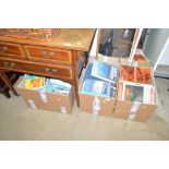 Three boxes of various books
