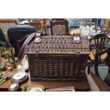 A wicker picnic hamper