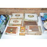 A collection of cigar boxes and contents