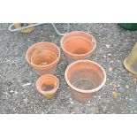 A quantity of terracotta plant pots