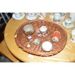 A basket containing various oriental ceramics to i
