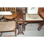 A small Edwardian drop leaf Sutherland table