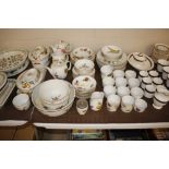 A quantity of Royal Worcester "Evesham" dinner and