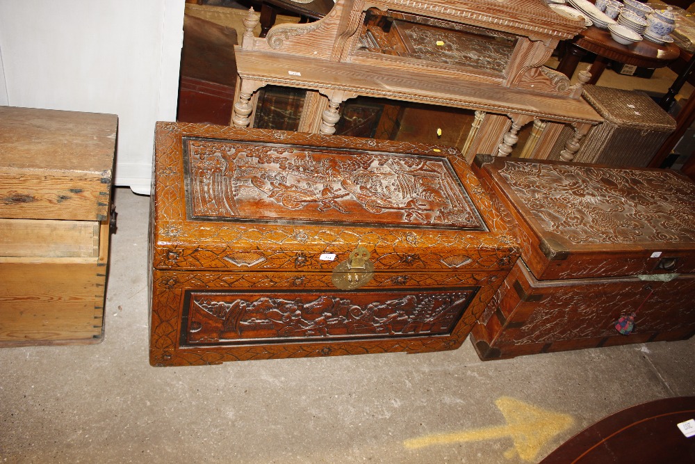 A Chinese carved camphor wood trunk