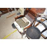 An Edwardian and inlaid mahogany salon elbow chair