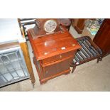 A cherry wood bedside cupboard fitted single drawe