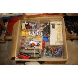 A box of various tin plate model vehicles, track a