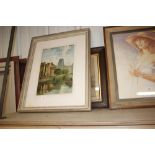 Two framed prints one depicting estuary scene afte