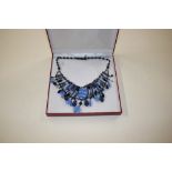 A blue glass costume necklace