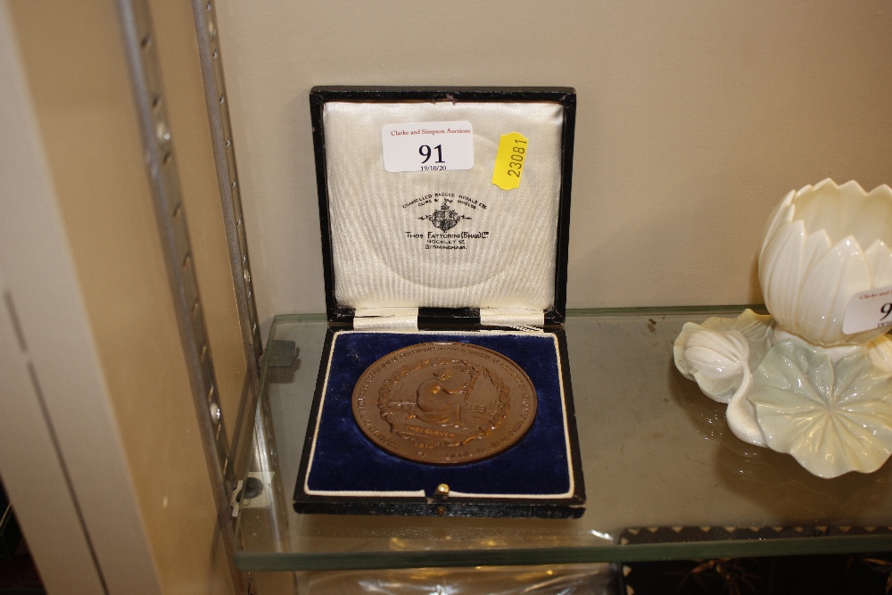 A bronze medallion relating to the Southern Assoc.