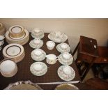 A quantity of Minton "Haddon Hall" trios with matc