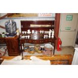 An Edwardian mahogany serpentine fronted sideboard