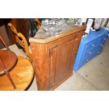 A 19th Century pine hanging corner cupboard