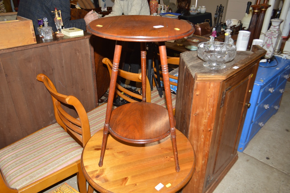 An Edwardian mahogany circular topped two tier tab