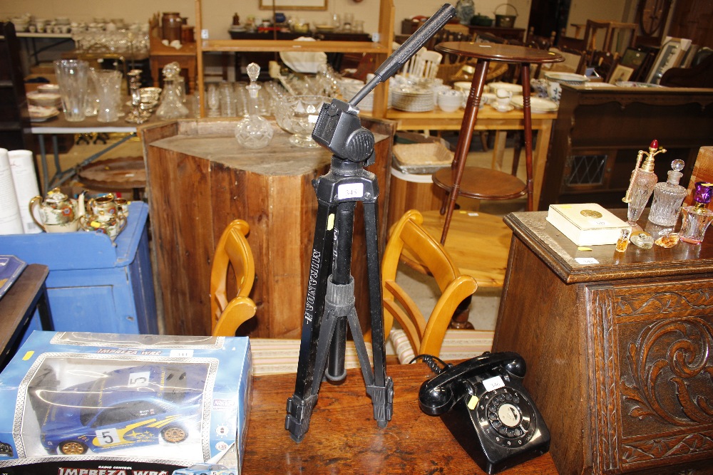 A Miranda camera tripod stand