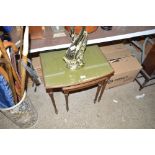 A pair of mahogany glass topped occasional tables