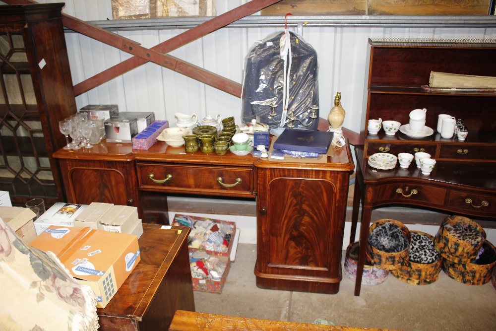 A Victorian mahogany twin pedestal sideboard