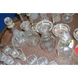 Four various glass decanters, one with a silver ne