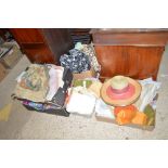 Five boxes of various textiles and hats