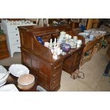 An American oak roll top desk by Derby