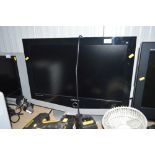 A Samsung flat screen television with remote contr