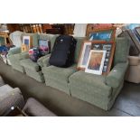 A green upholstered three piece suite