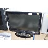 A Panasonic flat screen television with remote cont
